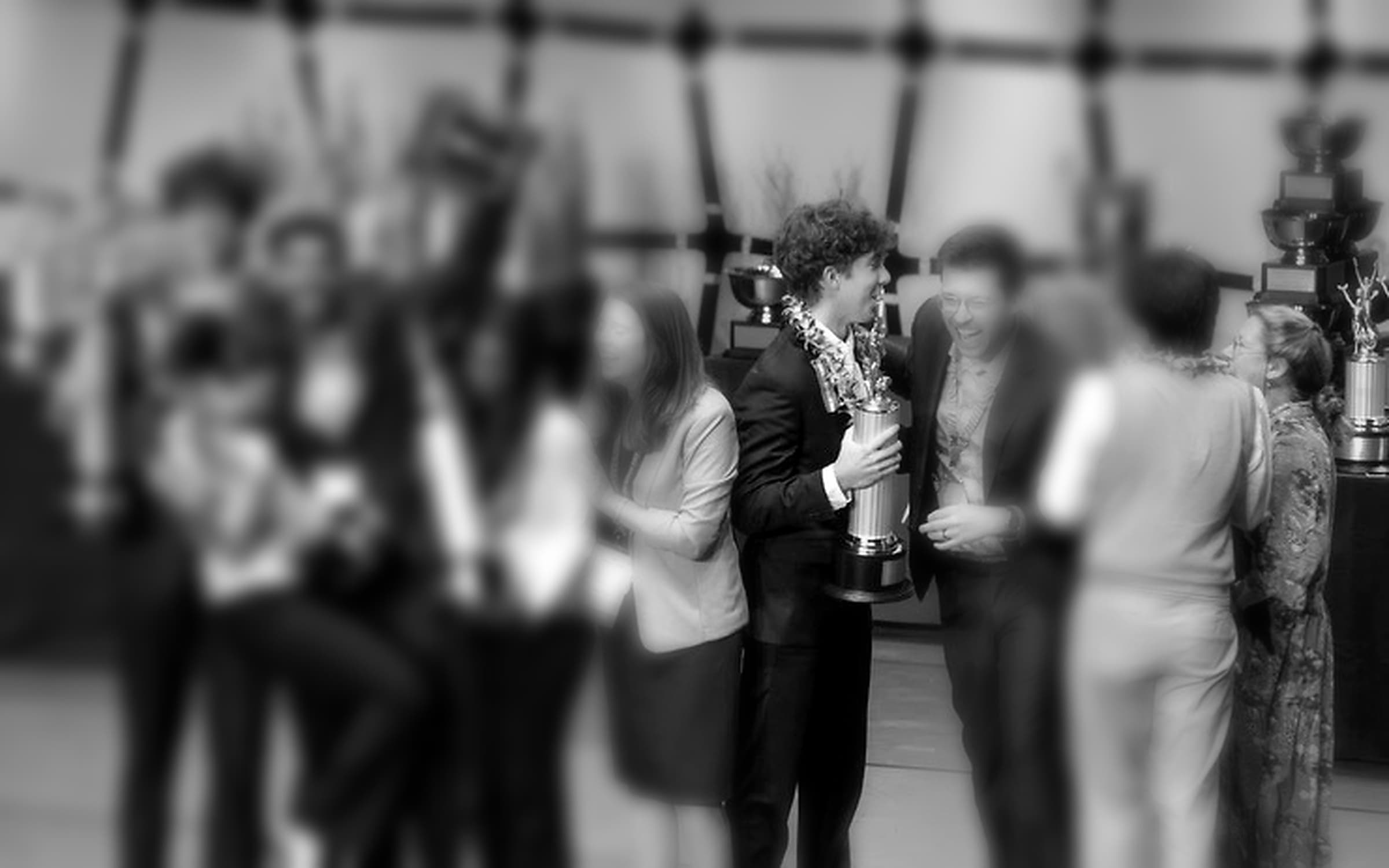 Evan Horner celebrating the World Schools Debate national championship with Carolina West Gold