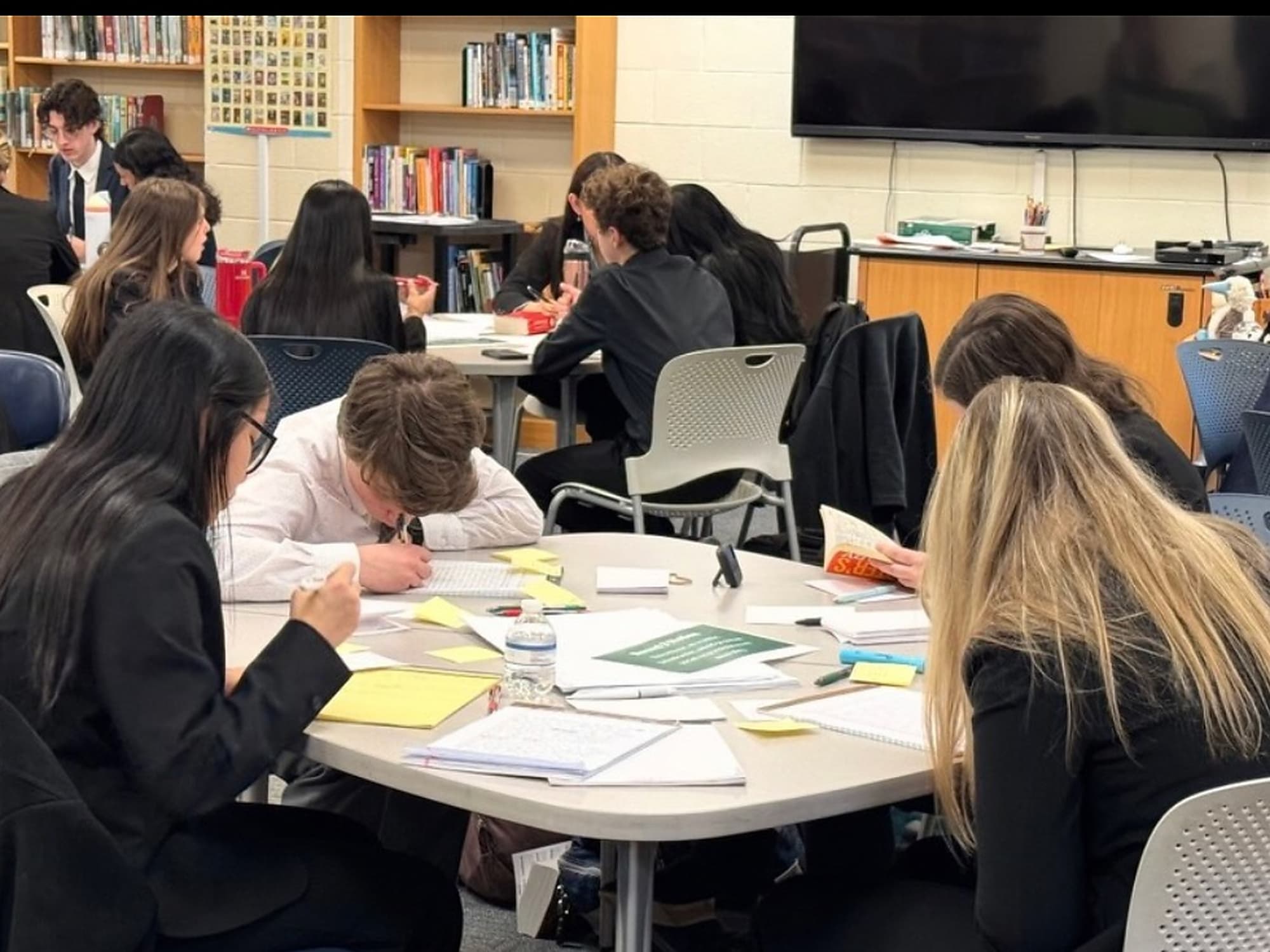 Myers Park Speech and Debate students preparing together at a tournament